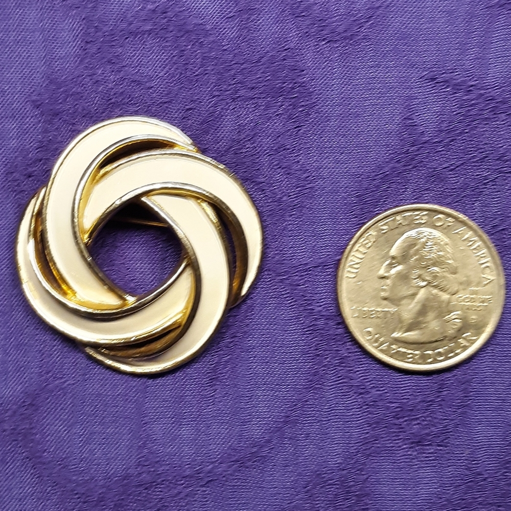 TRIFARI SIGNED GOLD-TONE BROOCH W/WHITE ENAMEL